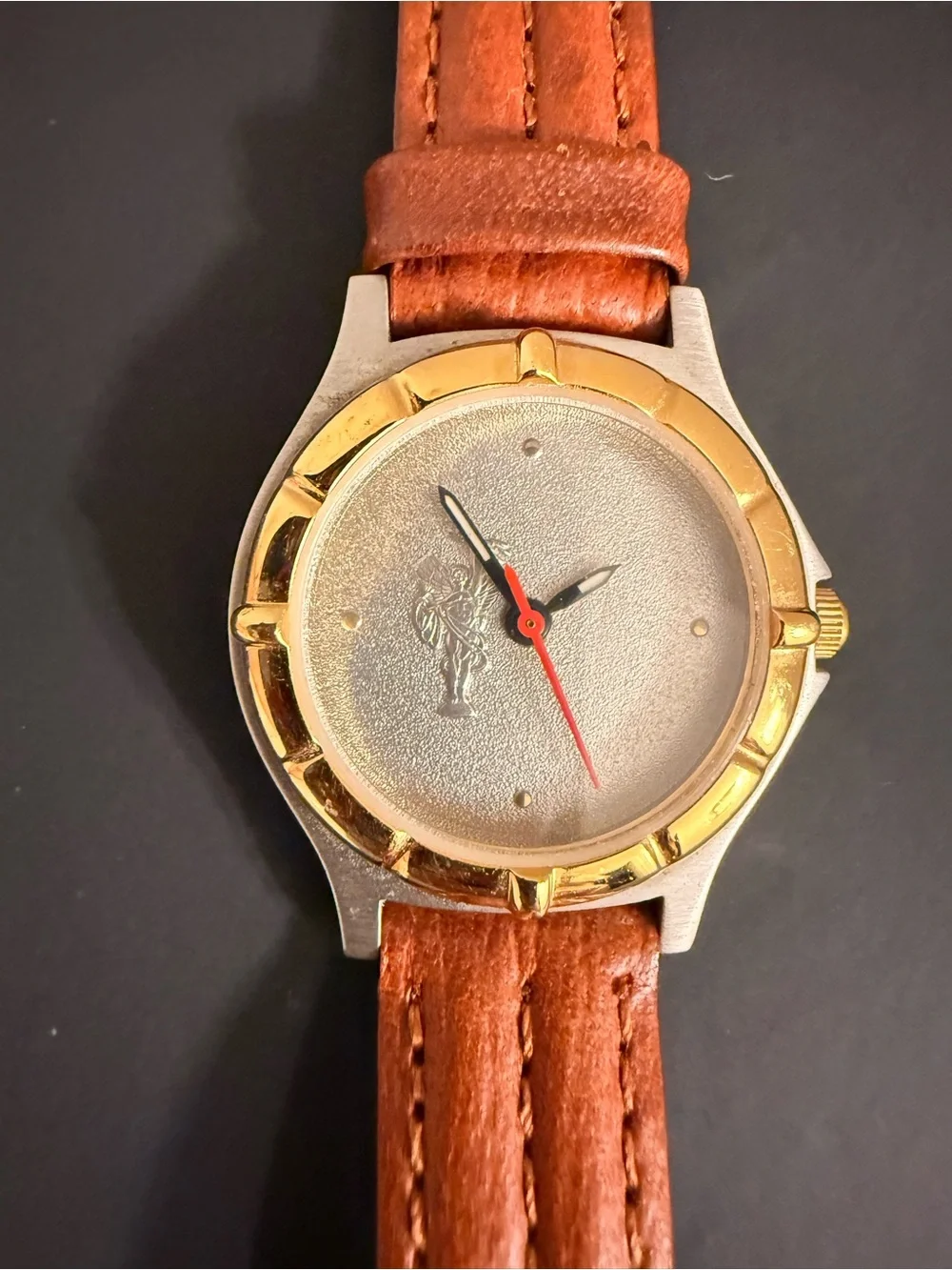 Brown Leather-Strap Watch with Gold-Bezel Accent need battery